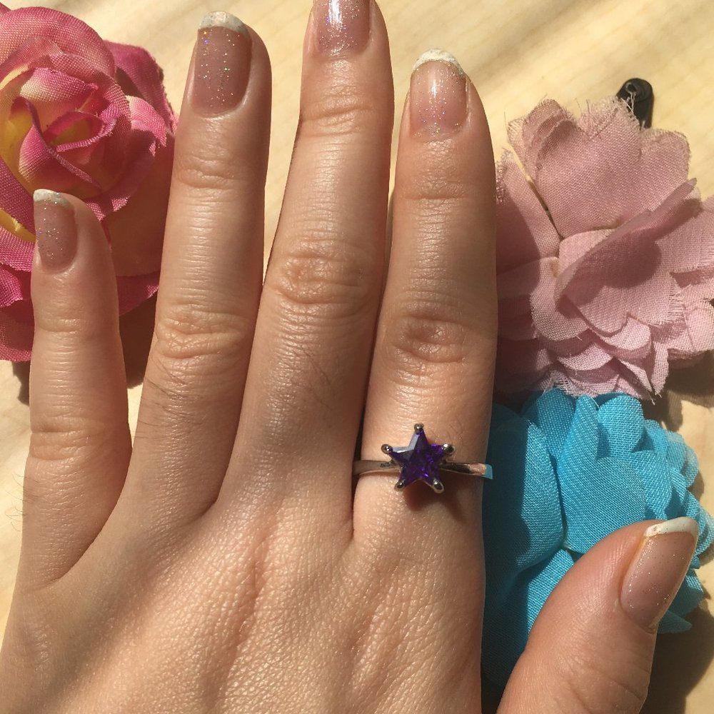 Silver-colored Ring with a Dark-Purple Star